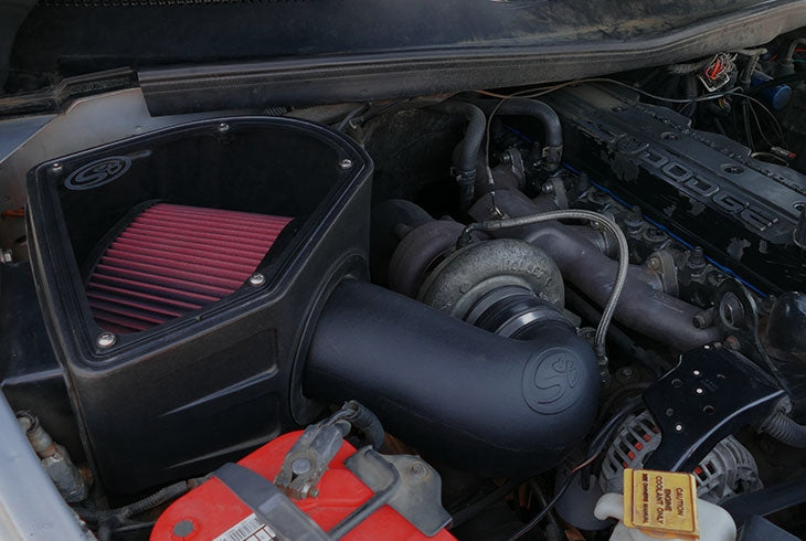 S&B FILTERS PRESENTS COTTON/DRY FILTER COLD AIR INTAKE KIT FOR 1994-2002 DODGE RAM CUMMINS 5.9L TO REVITALIZE YOUR RIDE